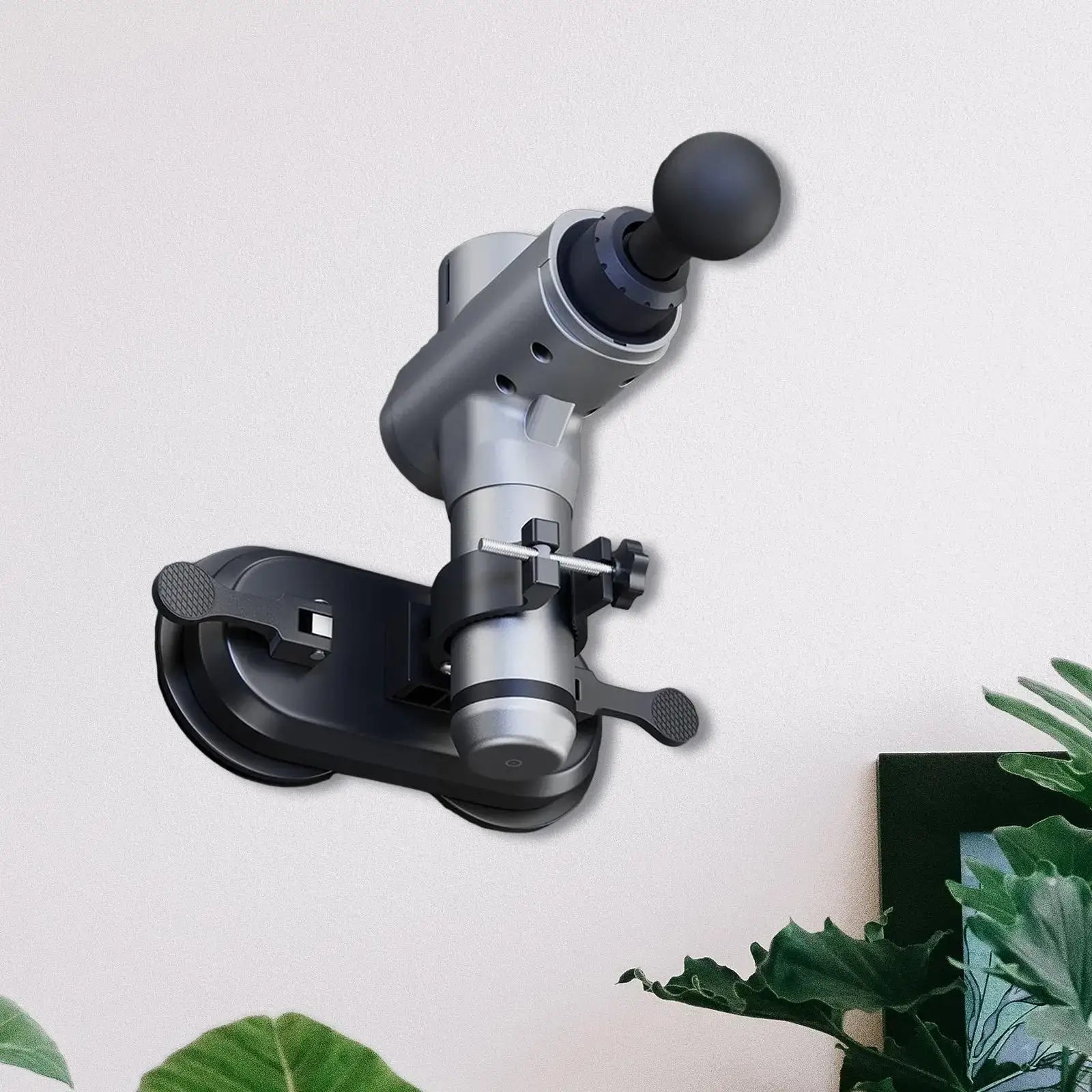 Massage machine holder with suction cup mount designed for easy access to hard-to-reach areas.